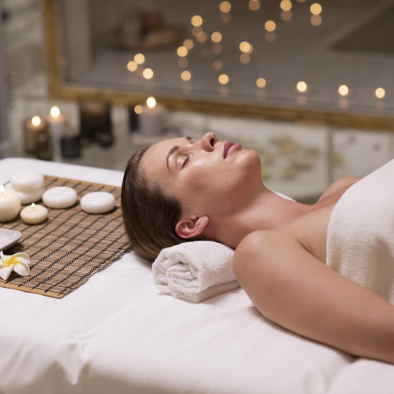 medium-shot-woman-laying-towel