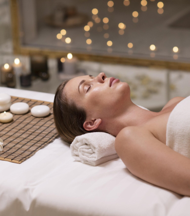 medium-shot-woman-laying-towel